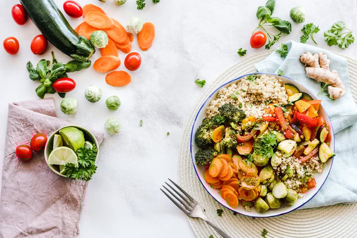 bowl of carrots, broccoli, and rice